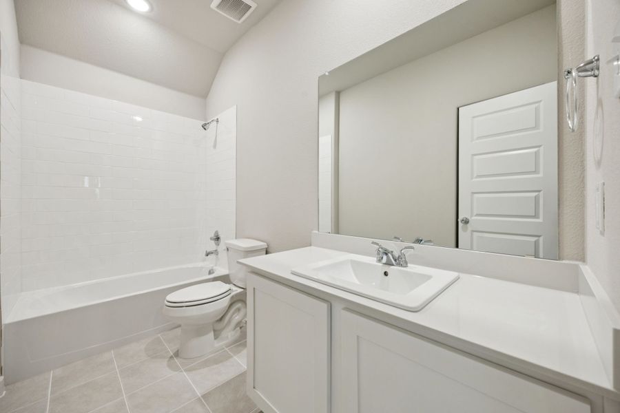 Bathroom in the Oscar home plan by Trophy Signature Homes – REPRESENTATIVE PHOTO Bathroom in the Oscar home plan by Trophy Signature Homes – REPRESENTATIVE PHOTO