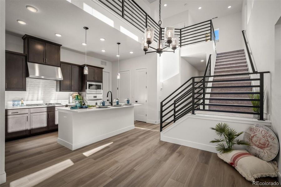 Furnished interior view inside a new home in Revel Crossing at Wolf Ranch - The Panorama Collection, Colorado Springs (Image 14).