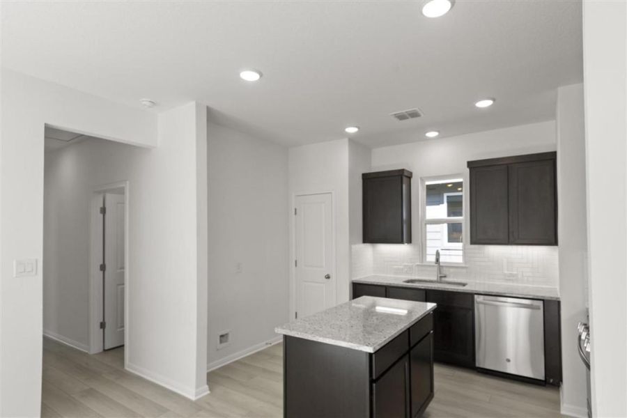 Furnished interior view inside a new home in Trace, San Marcos (Image 14).