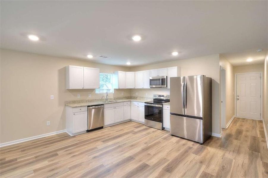 Furnished interior view inside a new home in , Monroe (Image 5).