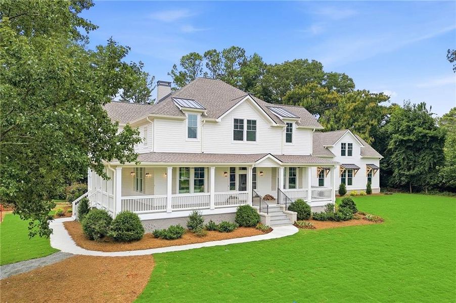 Front exterior of a new home in , Marietta, GA, highlighting curb appeal (Image 2). Front exterior of a new home in , Marietta, GA, highlighting curb appeal (Image 2).