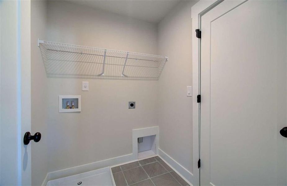 Spacious, unfurnished interior of a new home in The Paddocks at Doc Hughes, Buford (Image 38).