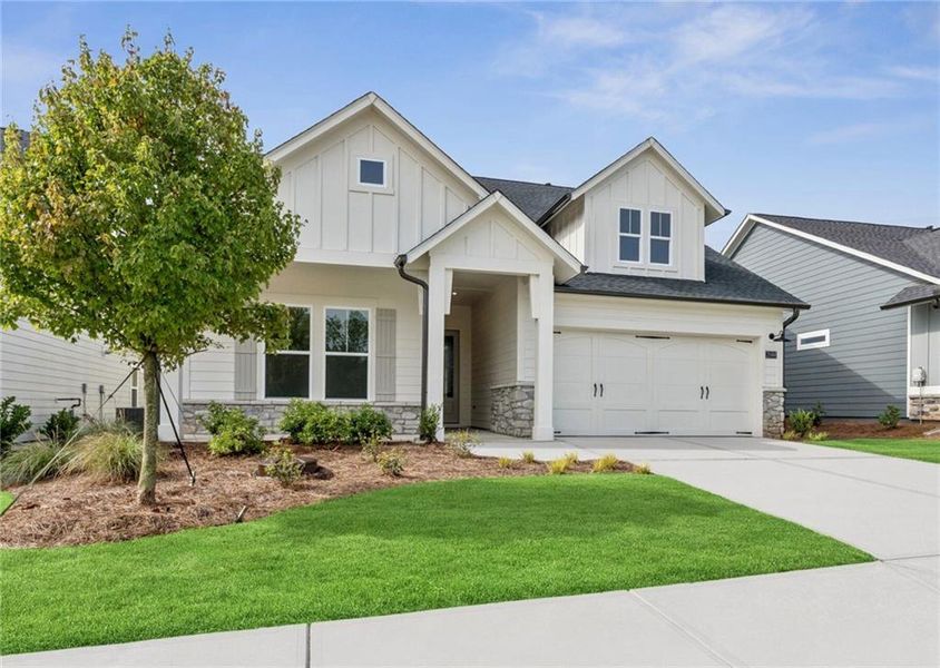 Front exterior of a new home in Crescent Pointe at Great Sky, Canton, GA, highlighting curb appeal (Image 16). Front exterior of a new home in Crescent Pointe at Great Sky, Canton, GA, highlighting curb appeal (Image 16).