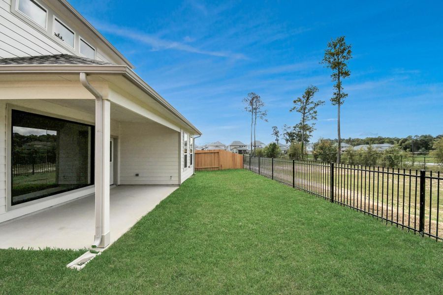 Backyard retreat, offering an abundance of space for kids to play and explore. The possibilities are endless in this outdoor haven, where the joy of open-air activities and family gatherings awaits.
