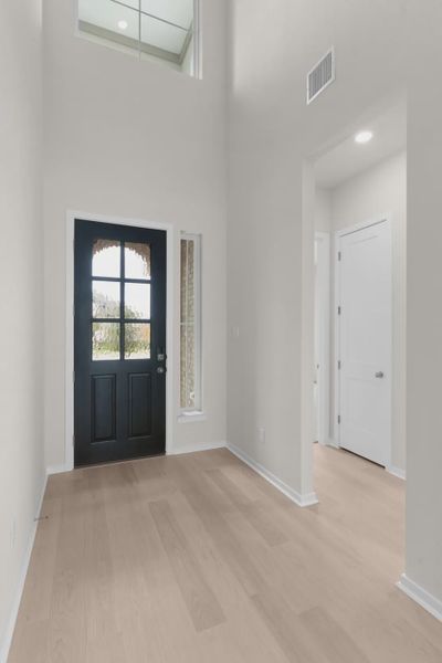 Representative unfurnished interior of a home built from the Madison by Chesmar Homes in University Heights, McKinney (Image 11).
