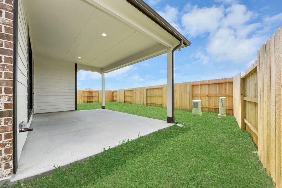 Experience outdoor living at its finest on this expansive covered patio, thoughtfully designed for BBQs and delightful outdoor dining. Experience outdoor living at its finest on this expansive covered patio, thoughtfully designed for BBQs and delightful outdoor dining.