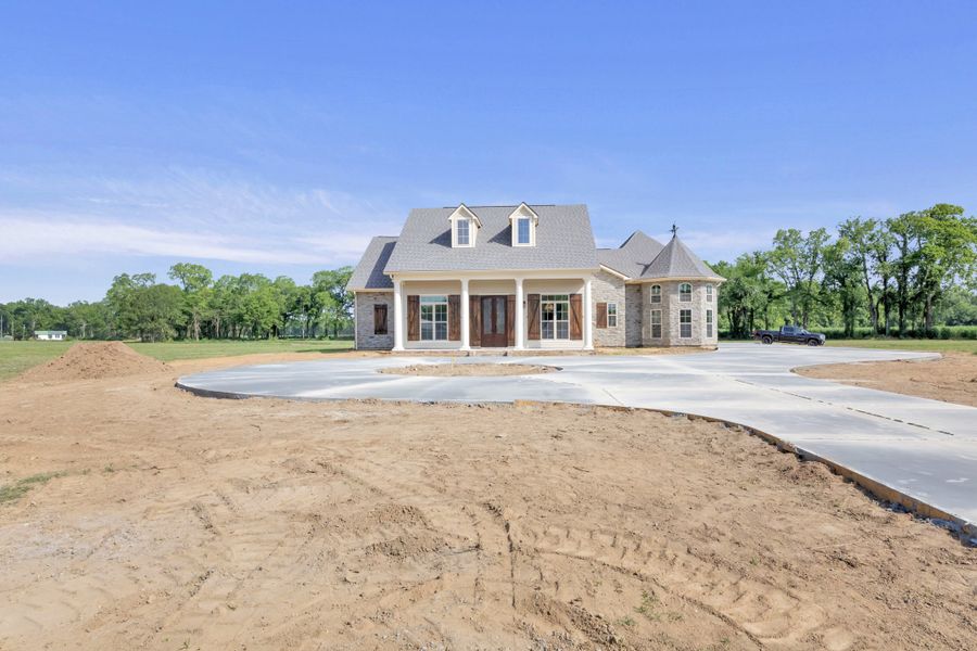 Representative exterior photo of a completed home built from the The Lafitte by Manuel Builders in Chapel Bend, Montgomery, TX (Image 21).