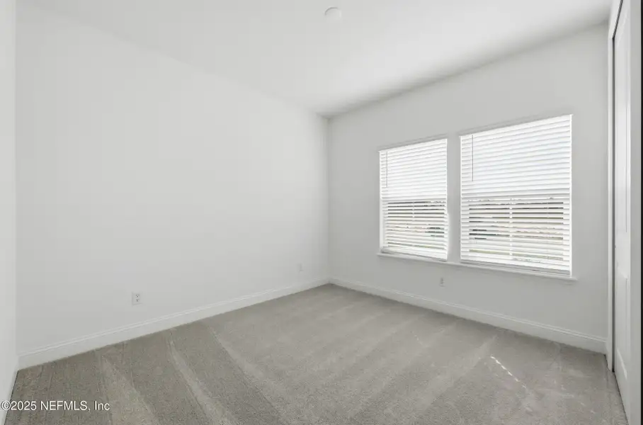 Spacious, unfurnished interior of a new home in Edenbrooke at Hyland Trail | 55+: Edenbrooke at Hyland Trail 60s, Green Cove Springs (Image 10). Spacious, unfurnished interior of a new home in Edenbrooke at Hyland Trail | 55+: Edenbrooke at Hyland Trail 60s, Green Cove Springs (Image 10).