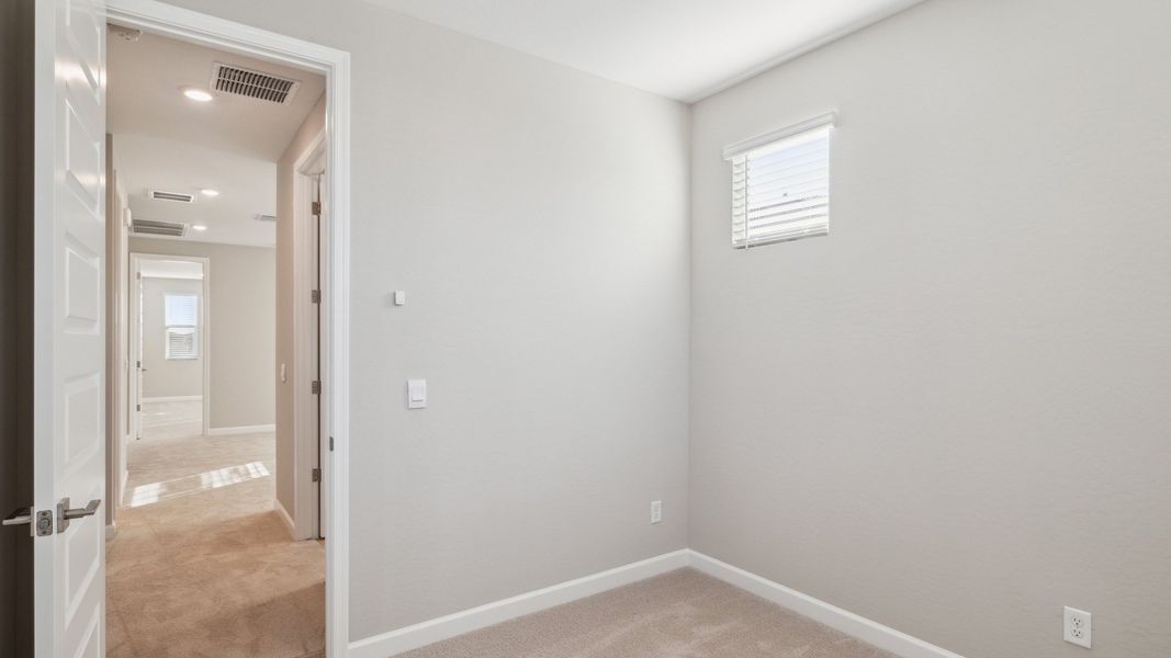 Spacious, unfurnished interior of a new home in Talinn Towns at Desert Ridge, Phoenix (Image 24).
