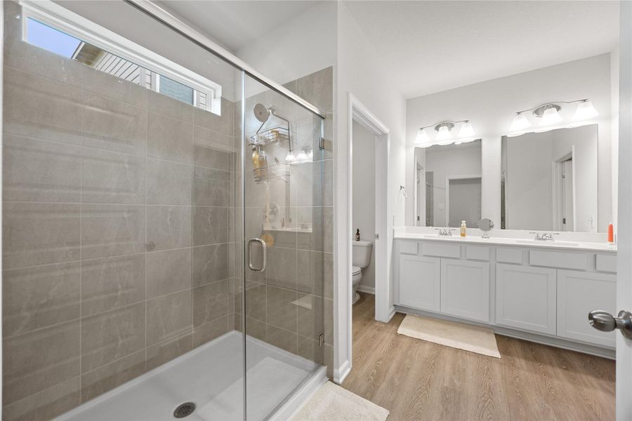 Furnished interior view inside a new home in Mill Creek Trails, Magnolia (Image 12).