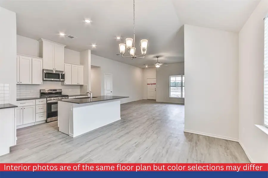 Indulge in culinary delights in this gourmet kitchen, where sleek granite countertops and elegant cabinetry create a seamless blend of style and functionality. The spacious dining area beckons you to savor meals with loved ones, surrounded by natural light streaming in through the large windows.