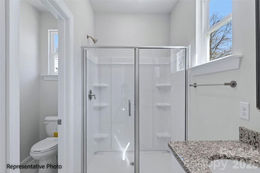Representative Photo. Primary Bathroom