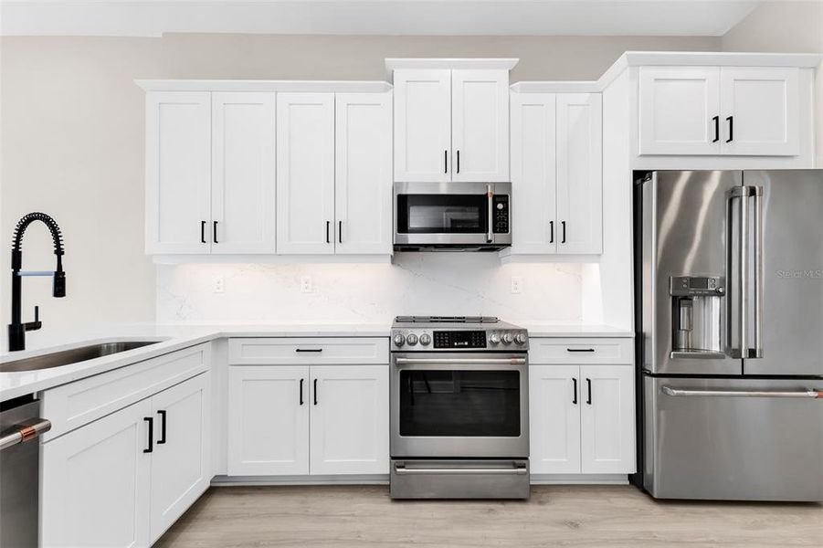 Furnished interior view inside a new home in , Punta Gorda (Image 11).