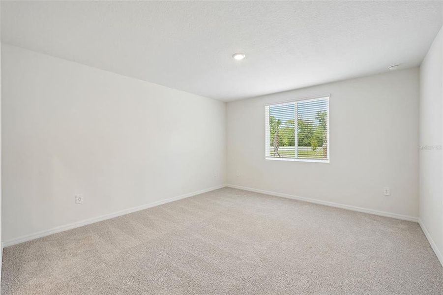 Spacious, unfurnished interior of a new home in Pine Ridge Meadows, Hudson (Image 44).