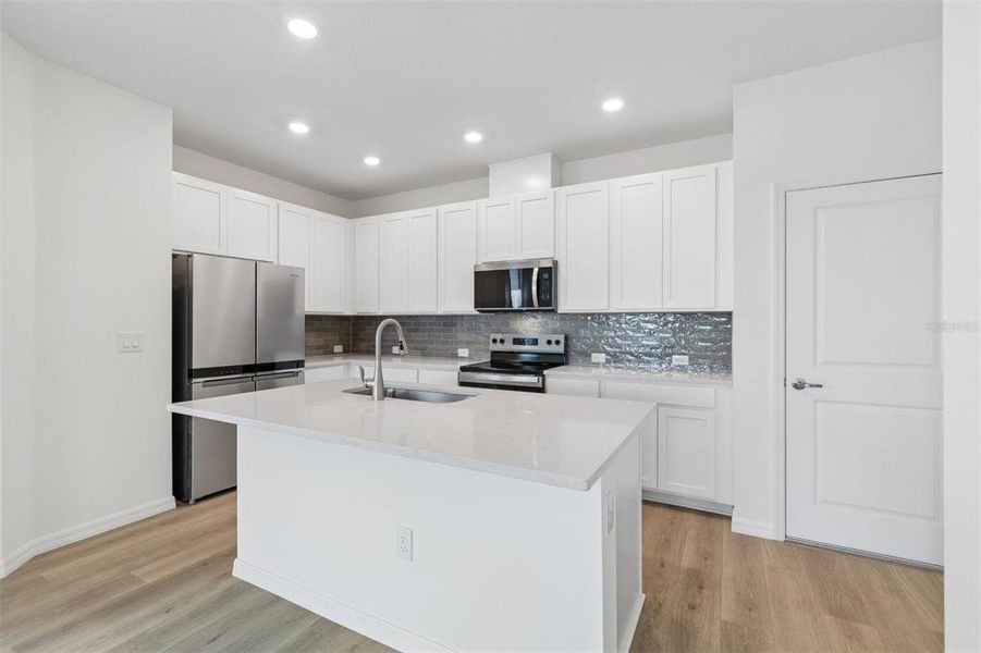 Furnished interior view inside a new home in Waterset Townhomes, Apollo Beach (Image 8).