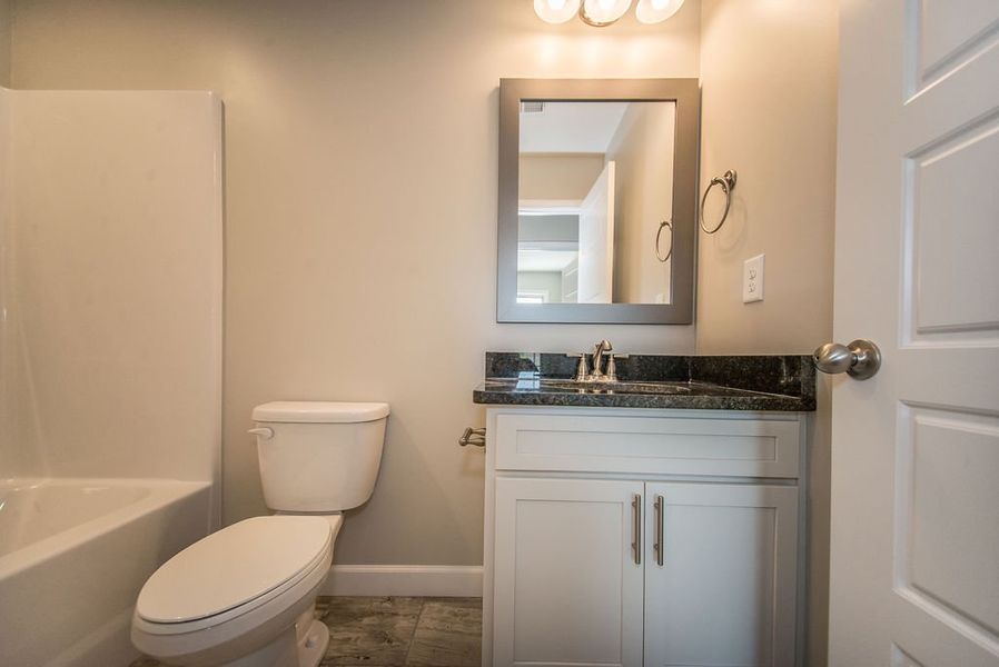 Representative furnished interior of a home built from the Pacific by Enchanted Homes in Hampshire Heights, Moore (Image 28).