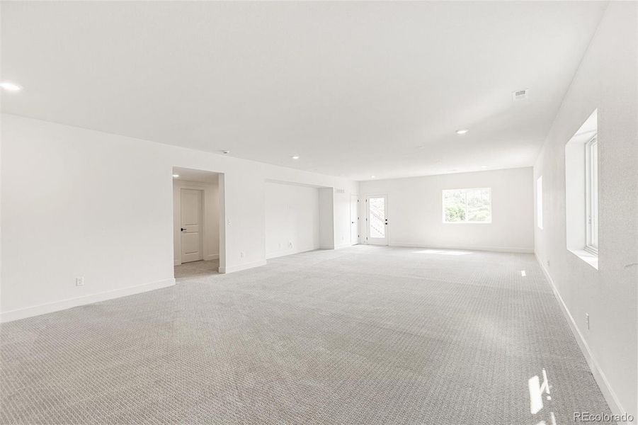 Spacious, unfurnished interior of a new home in Terrain Oak Valley, Castle Rock (Image 24).