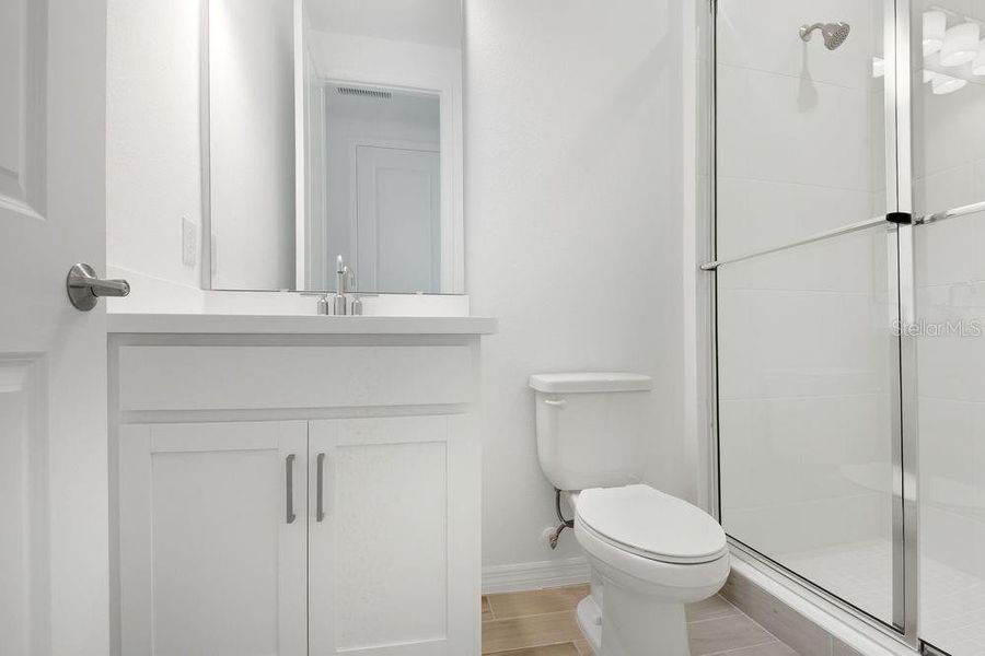 Furnished interior view inside a new home in Ardisia Park, New Smyrna Beach (Image 30).