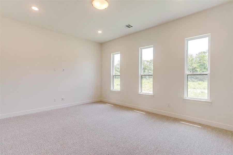 Empty room with carpet flooring