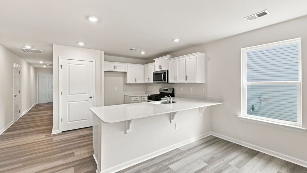 Furnished interior view inside a new home in Tyger Pines, Moore (Image 6).