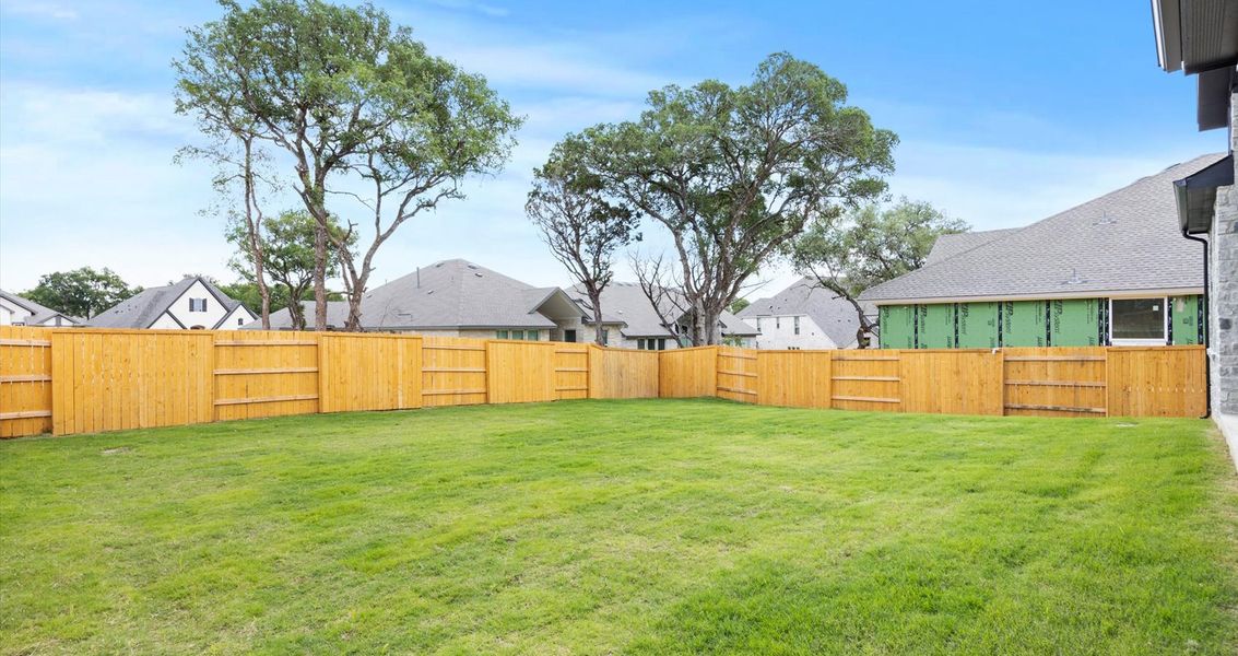 Exterior details and patio area of a home in 6 Creeks, Kyle (Image 23).