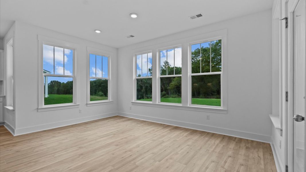 Memorable meals start in this exclusive extended breakfast area featuring elegant trim and natural light