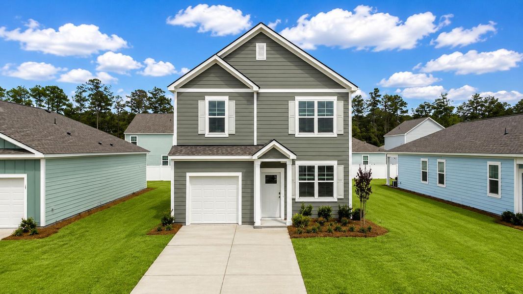 Front exterior of a new home in Hillcrest, Ravenel, SC, highlighting curb appeal (Image 2).