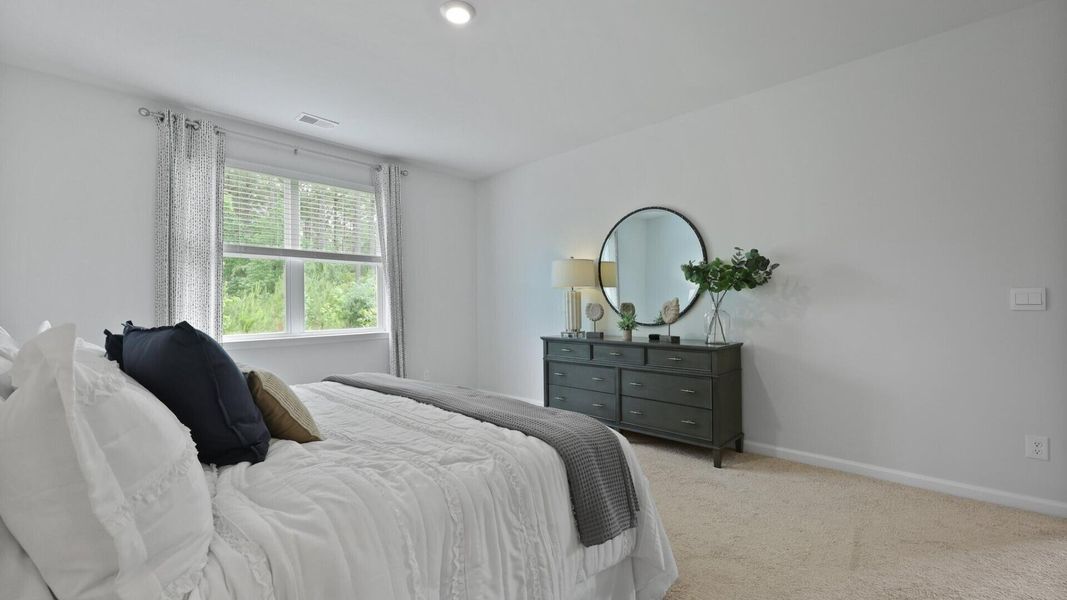 Furnished interior view inside a new home in Pine Hills at Cane Bay, Summerville (Image 27). Furnished interior view inside a new home in Pine Hills at Cane Bay, Summerville (Image 27).