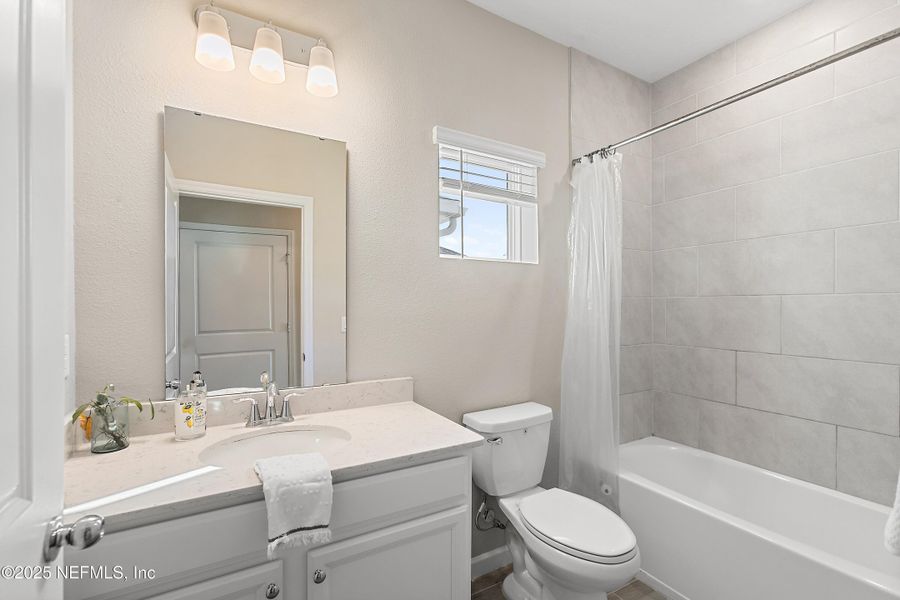 Furnished interior view inside a new home in Gentle Woods North, Jacksonville (Image 15).