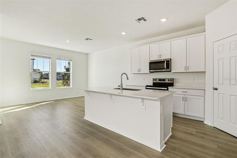 Furnished interior view inside a new home in The Meadow at Crossprairie Bungalows, St. Cloud (Image 4).