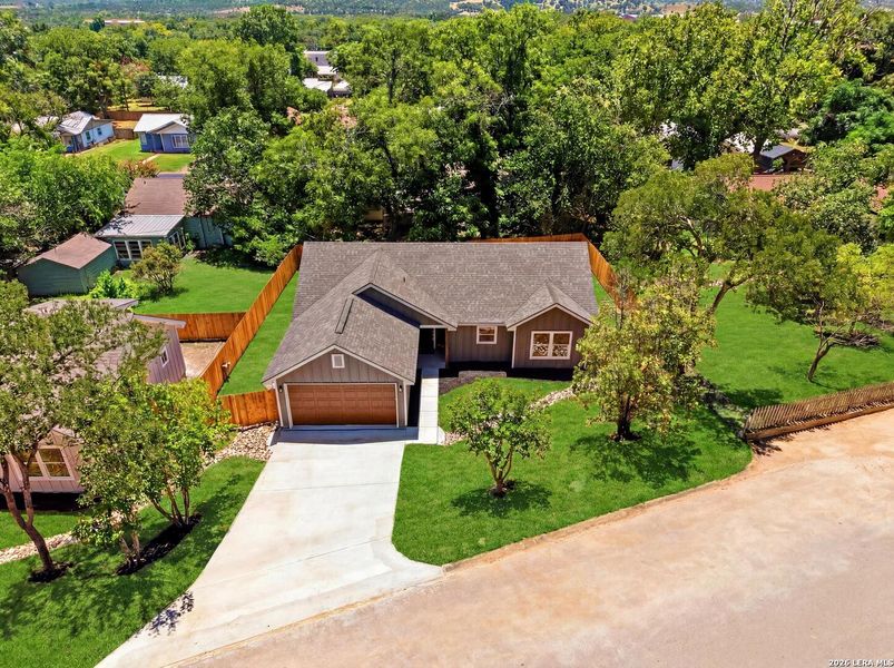 Front exterior of a new home in , Kerrville, TX, highlighting curb appeal (Image 23).