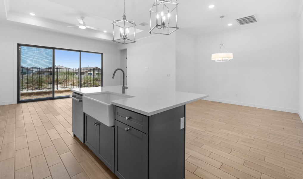 Kitchen with white apron-front sink