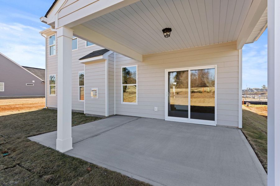 Exterior details and patio area of a home in Founders Club, Moore (Image 18).