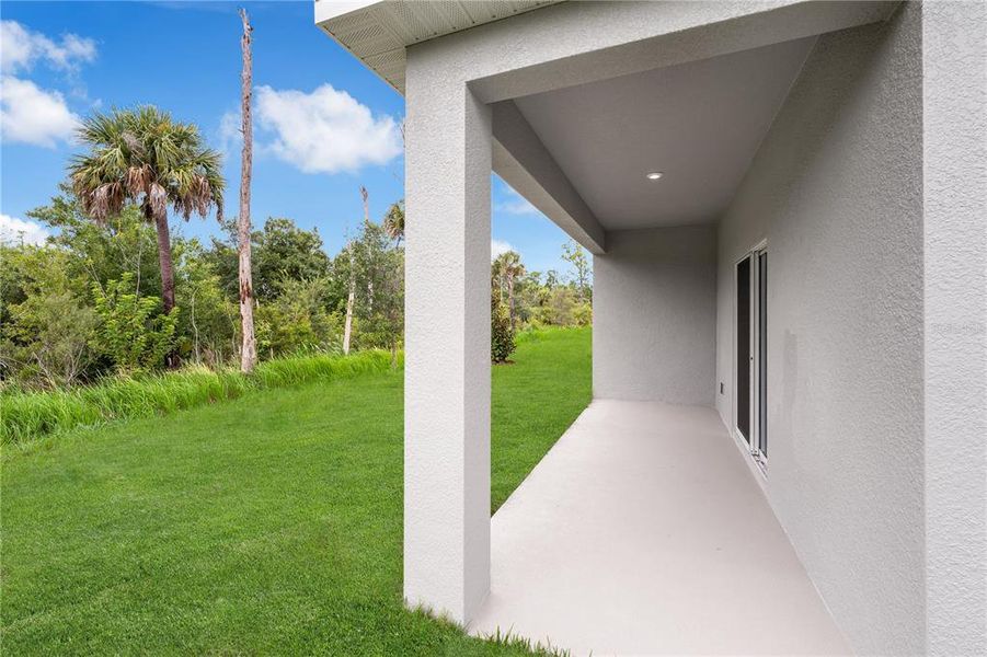 Exterior details and patio area of a home in Green Leaf, West Melbourne (Image 3).