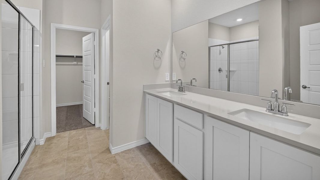 Representative furnished interior of a home built from the H233 Alpine by D.R. Horton in Lilybrooke at Legacy Hills, Celina (Image 5).