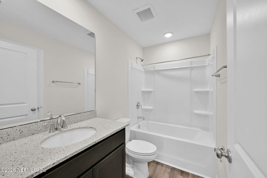 Furnished interior view inside a new home in Baxley Villas, Middleburg (Image 6).