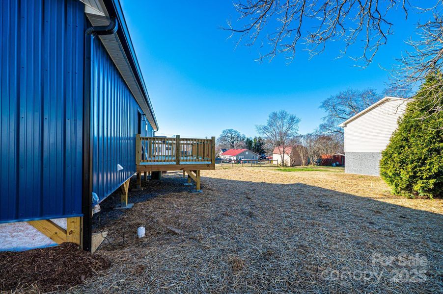 Exterior details and patio area of a home in , Valdese (Image 21).
