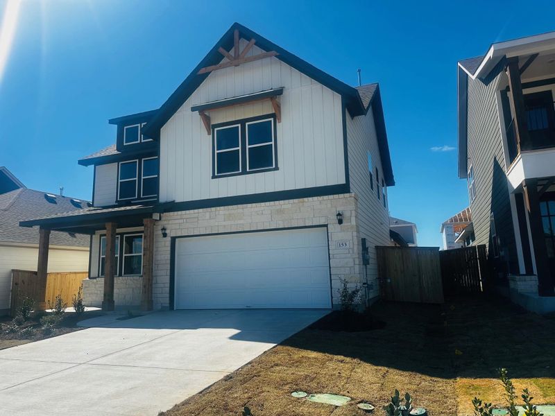 Front exterior of a new home in Patterson Ranch, Georgetown, TX, highlighting curb appeal (Image 1). Front exterior of a new home in Patterson Ranch, Georgetown, TX, highlighting curb appeal (Image 1).