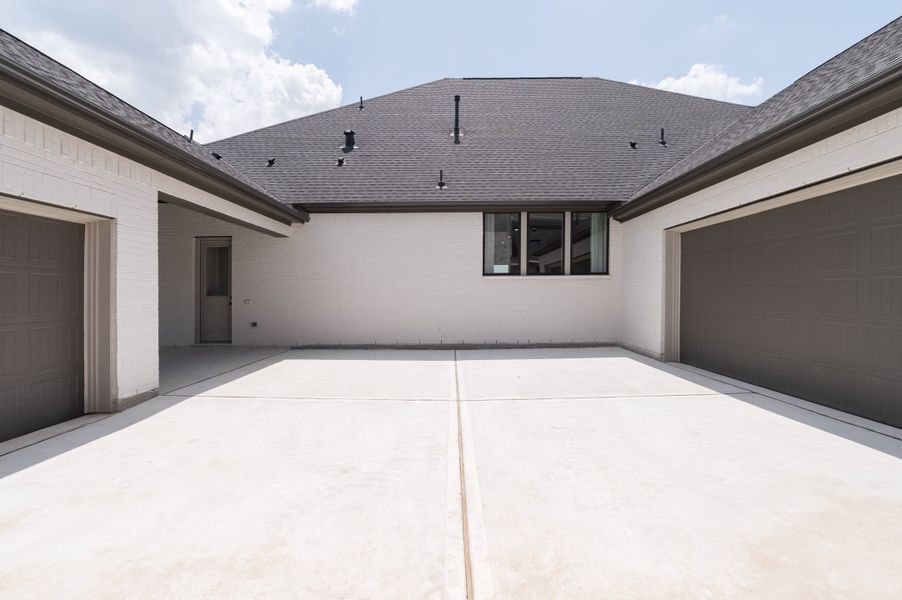 Representative exterior details of a home built from the Carignan by Tri Pointe Homes in Woodson’s Reserve, Spring (Image 4).