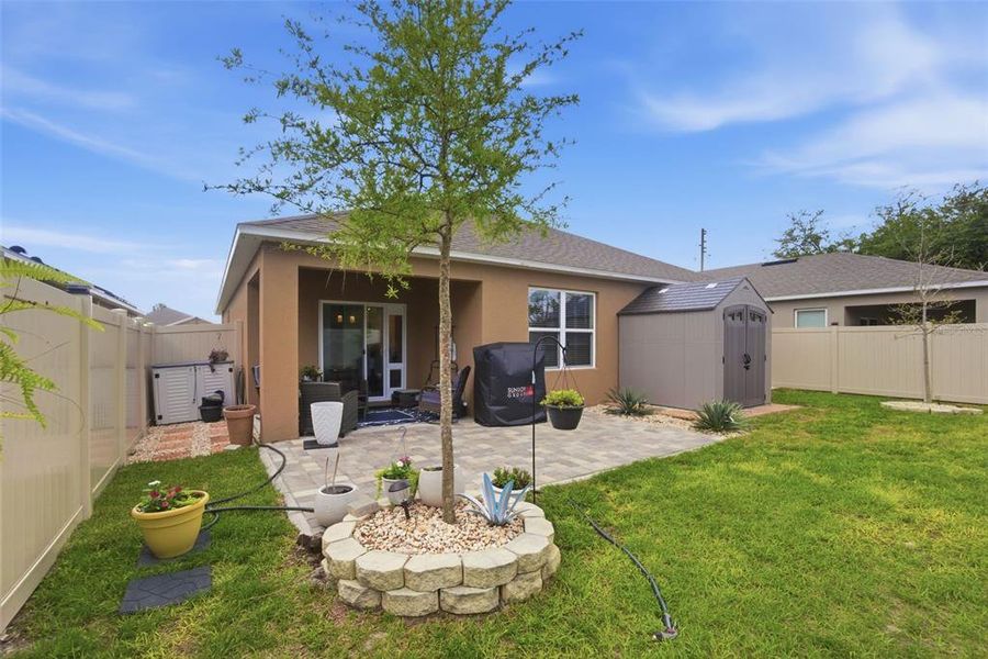 Exterior details and patio area of a home in Cadence at Parc Hill, Orange City (Image 3).