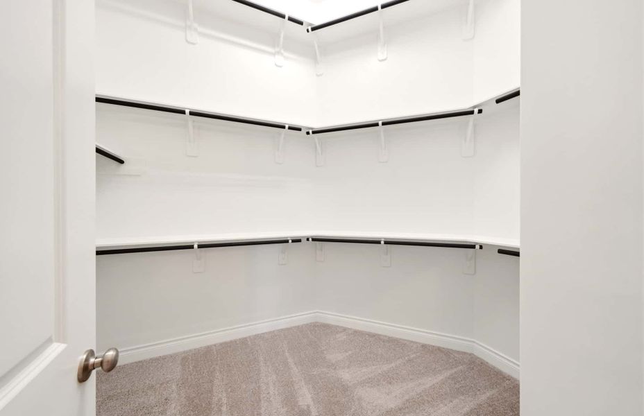 Spacious, unfurnished interior of a new home in The Woodlands Hills 65′, Willis (Image 53).