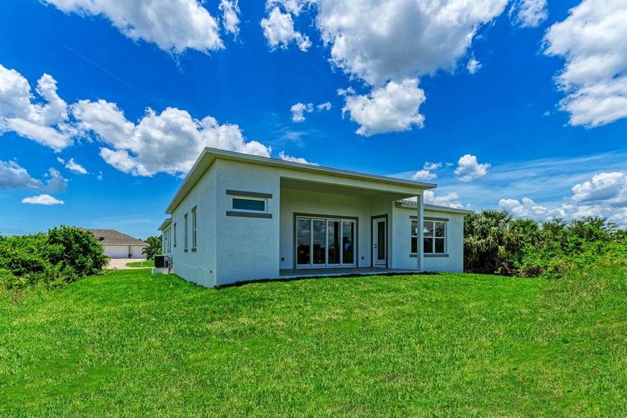 Exterior details and patio area of a home in , Port Charlotte (Image 30).