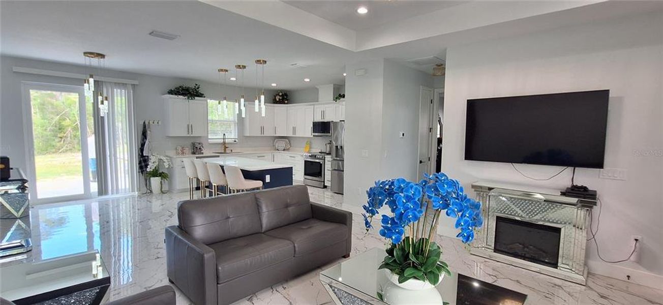 Furnished interior view inside a new home in , Webster (Image 10).