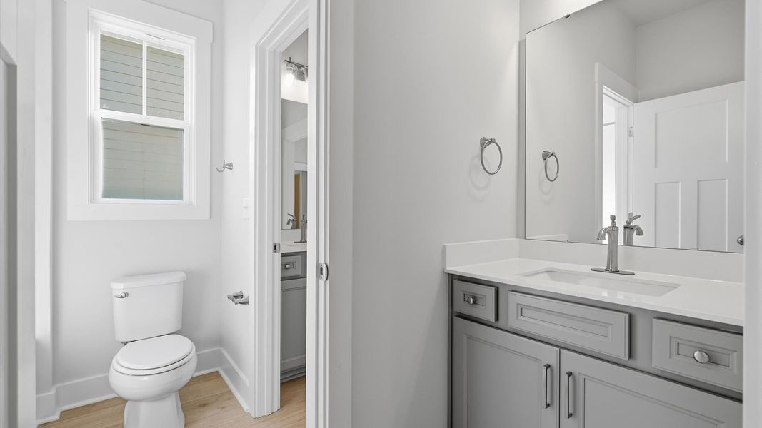 Accomplished full bath designed with both comfort and sophistication in mind at Wells Crossing
