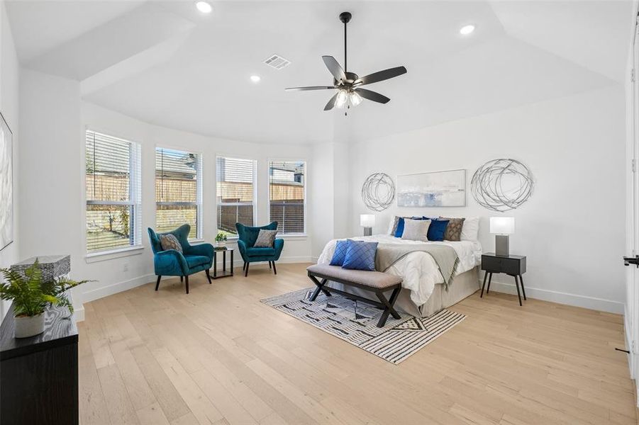 Bedroom with ceiling fan, light wood-style floors, and recessed lighting Bedroom with ceiling fan, light wood-style floors, and recessed lighting