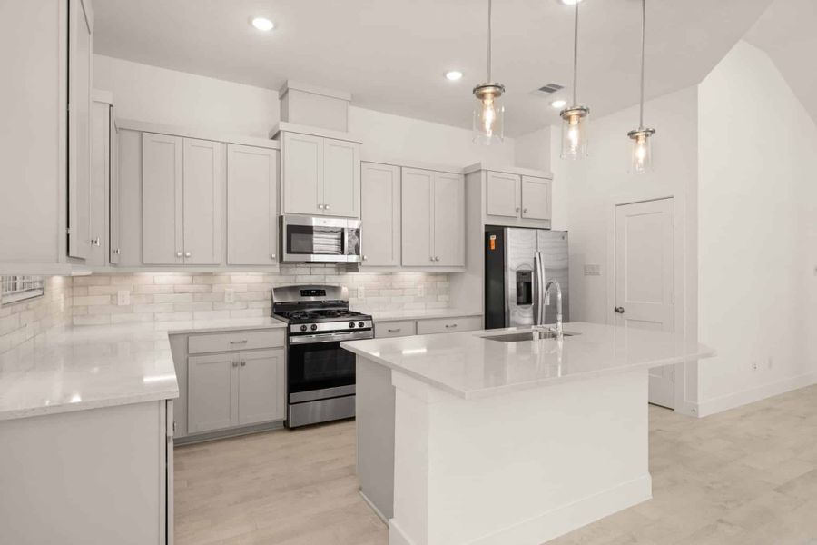 Furnished interior view inside a new home in Sienna, Missouri City (Image 4).