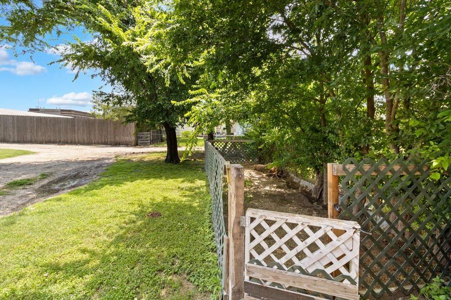 Exterior details and patio area of a home in , Groesbeck (Image 22). Exterior details and patio area of a home in , Groesbeck (Image 22).