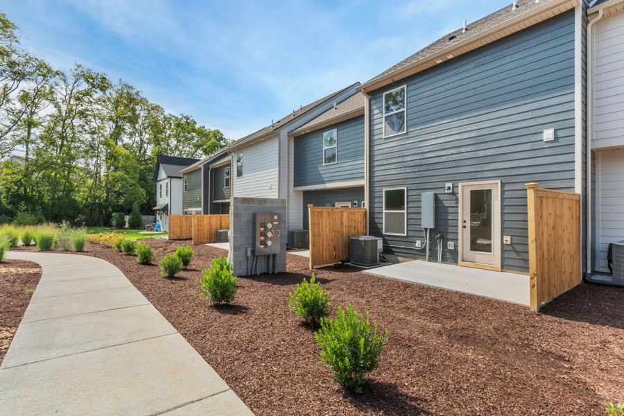 Front exterior of a new home in Oxford Station, Gallatin, TN, highlighting curb appeal (Image 20). Front exterior of a new home in Oxford Station, Gallatin, TN, highlighting curb appeal (Image 20).