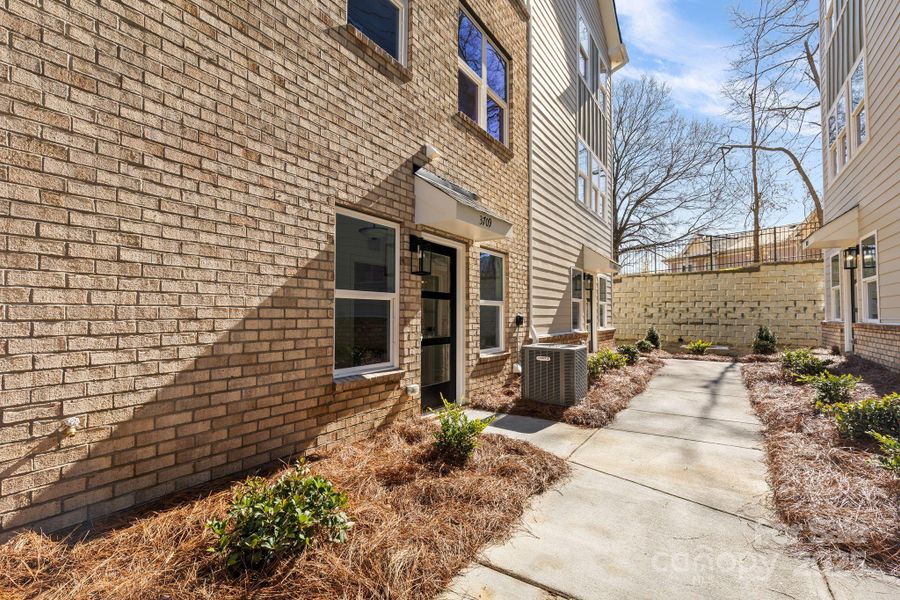 Front exterior of a new home in , Charlotte, NC, highlighting curb appeal (Image 2).
