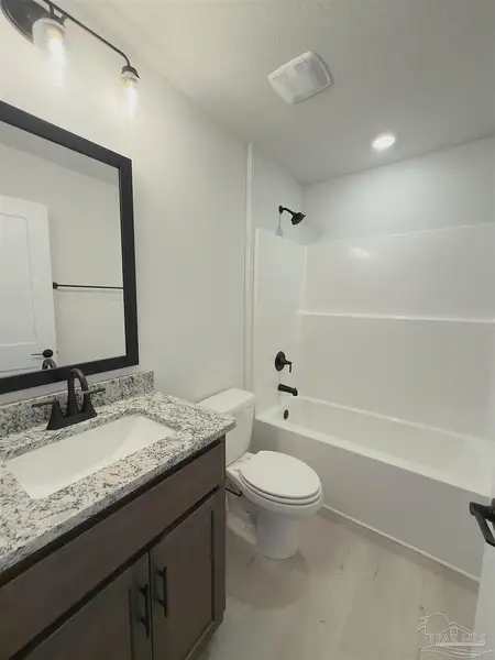 Furnished interior view inside a new home in Allison Acres, Cantonment (Image 6).